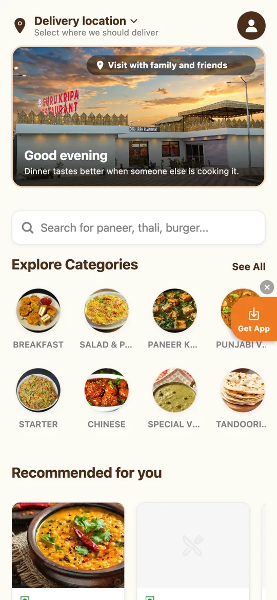Guru Kripa online food ordering app on a phone